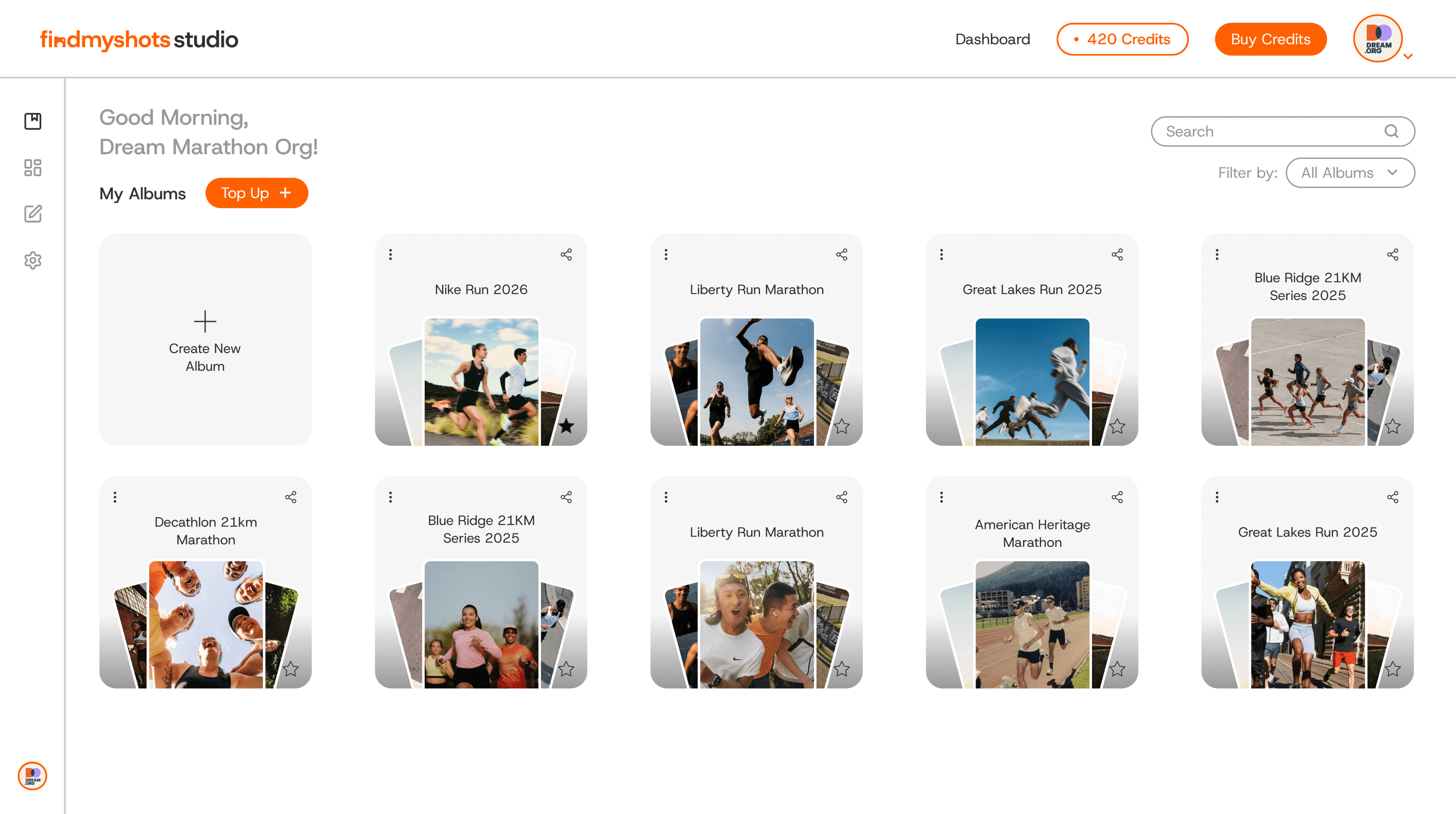 Studio's My Albums dashboard listing event albums with credit balance and upload controls